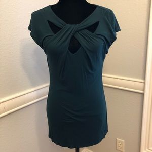 Green top with cross front design